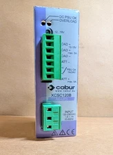 Cabur  XCSC120B DIN Rail AC UPS, 12VDC Powersupply w/ Battery charger, 120V(New)