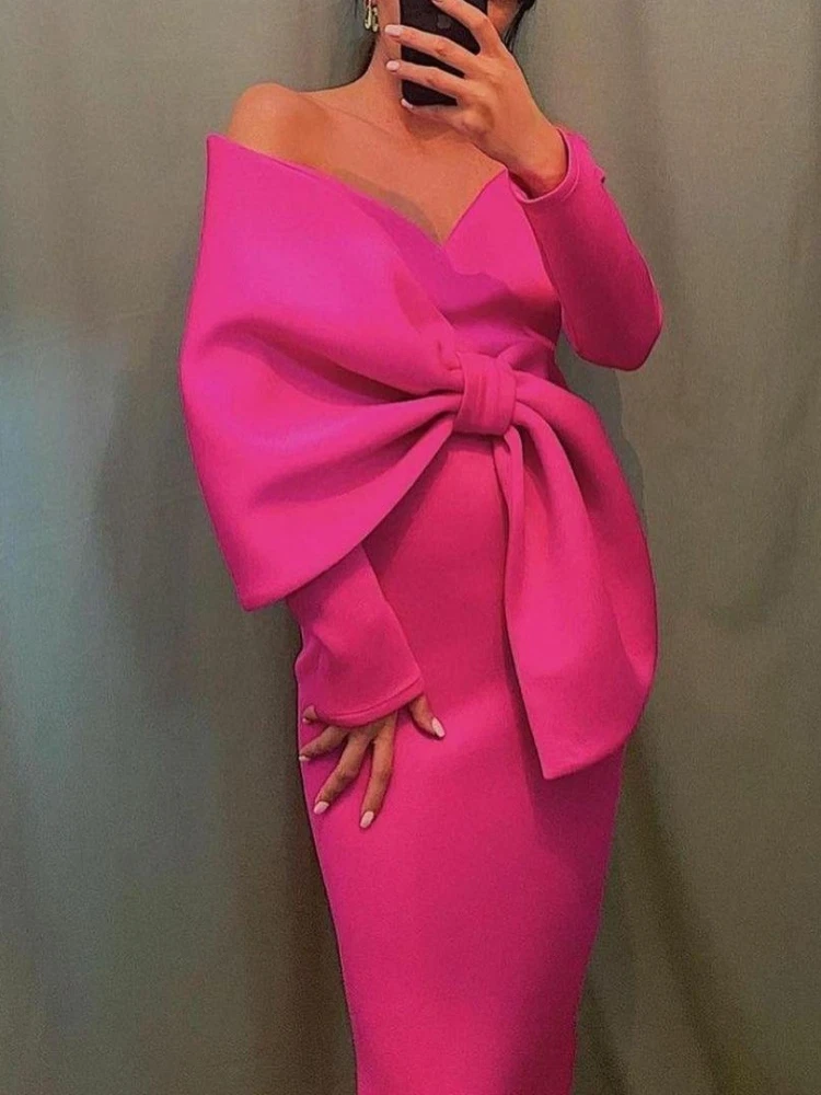 Dress with big bow on clearance shoulder