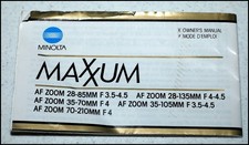 Early Minolta Maxxum AF zoom lens instruction / spec sheet with crossed X's