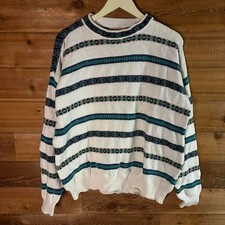 Vintage White and blue striped sweater with a retro vibe