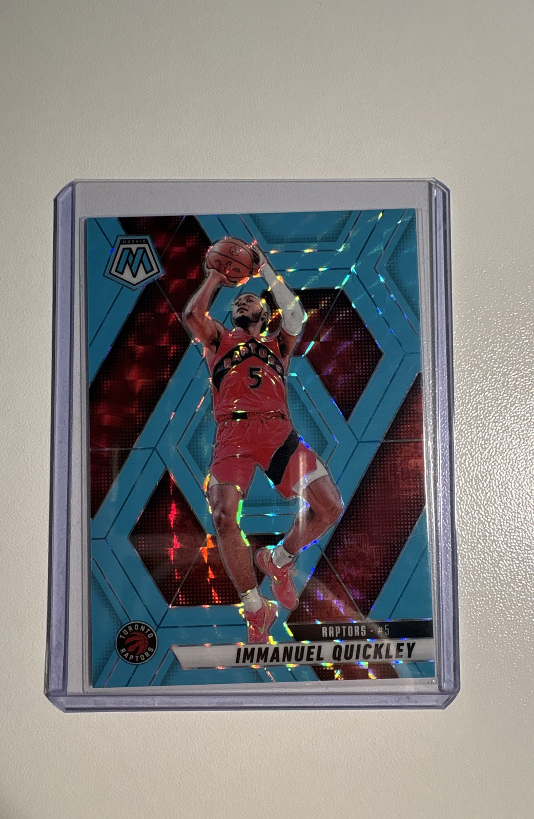 2024-25 Panini Mosaic Immanuel Quickley #185 Fluorescent Blue Mosaic Prizm /75