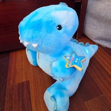 NWT FAO Schwarz Glow Brights Blue Light Up Dinosaur Stuffed Animal Toy