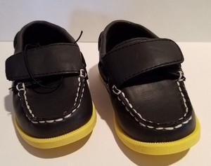 black shoes with yellow soles