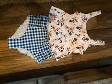 Women  s tankini size small. Floral top with checked bottoms. Brand new 
