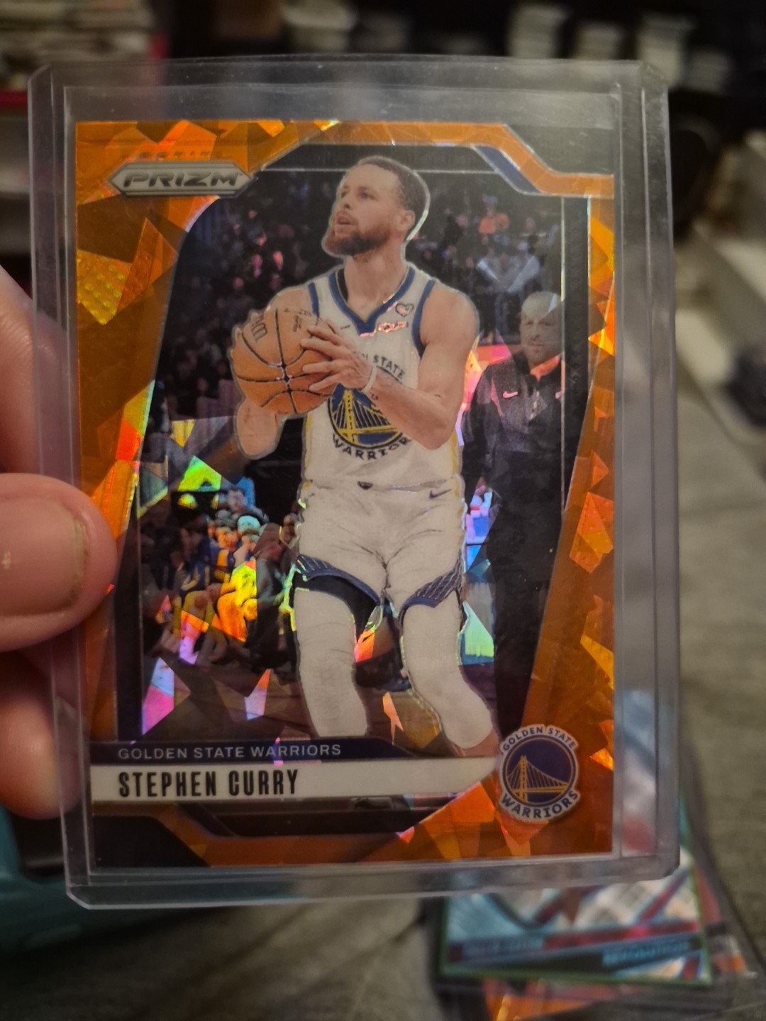 Stephen Curry 2024-2025 NBA Prizm Orange Cracked Ice #134 SP Warriors