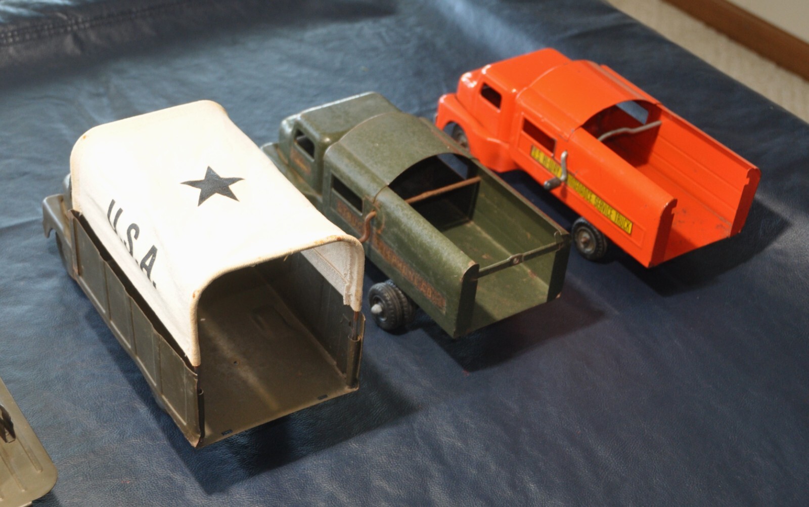 9 Vintage 1950's Structo Toy Trucks, good to very good condition for