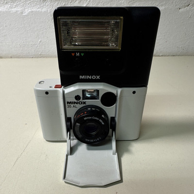MINOX 35 AL Kompaktkamera 35mm mit FC 35 Blitz & Tasche, Schwarz/Silber