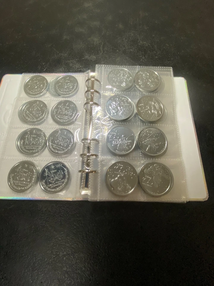 Disney 100 Years of Wonder 70 Medallion Coins w/ 2 Bonus Pirates Coins EXCELLENT - Image 4 of 4