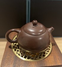 Lady Wei’ Art   Handmade purple clay teapots from Yixing, China