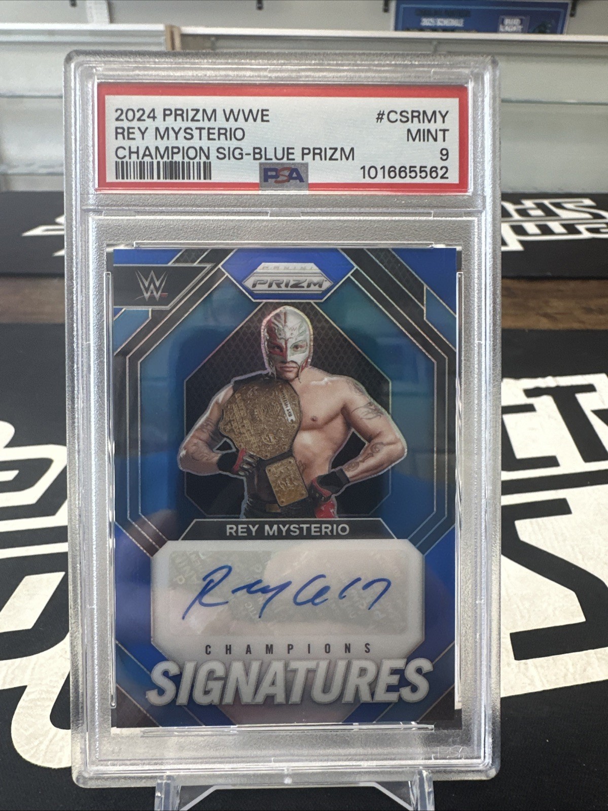 2024 Panini Prizm WWE - Champion Signatures Rey Mysterio  Blue Prizm /49 PSA 9