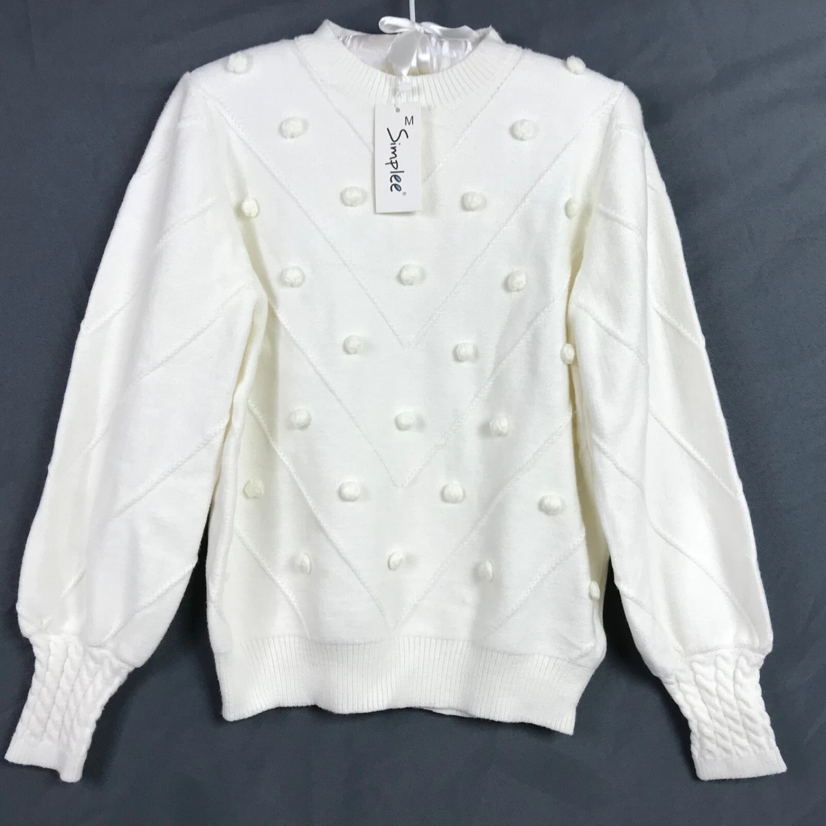 Sweater with deals puff balls