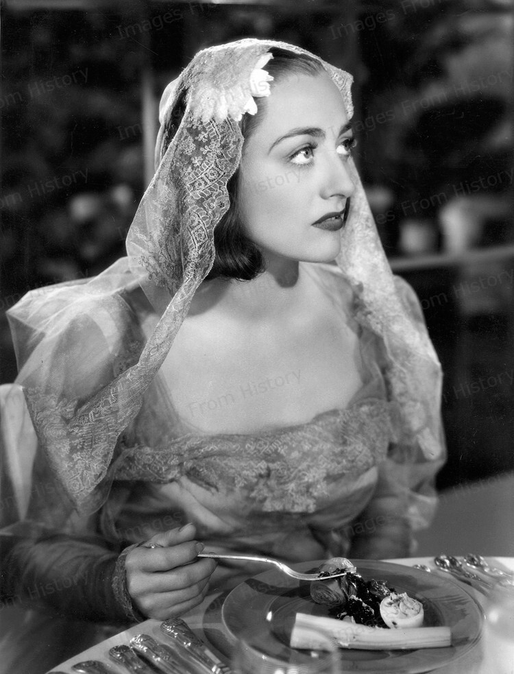 joan crawford red dress Publicity photo fro The Bride Wore Red, 1937 with Joan Crawford, Robert Young, and Franchot Tone
