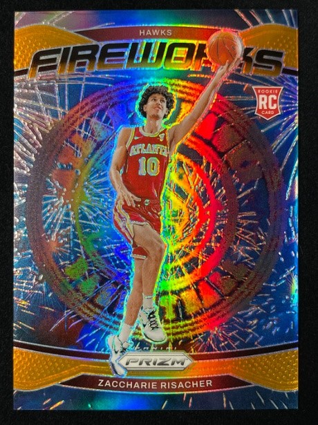 Zaccharie Risacher 2024-25 Panini Prizm Fireworks Orange Prizm 42/49 RC #6