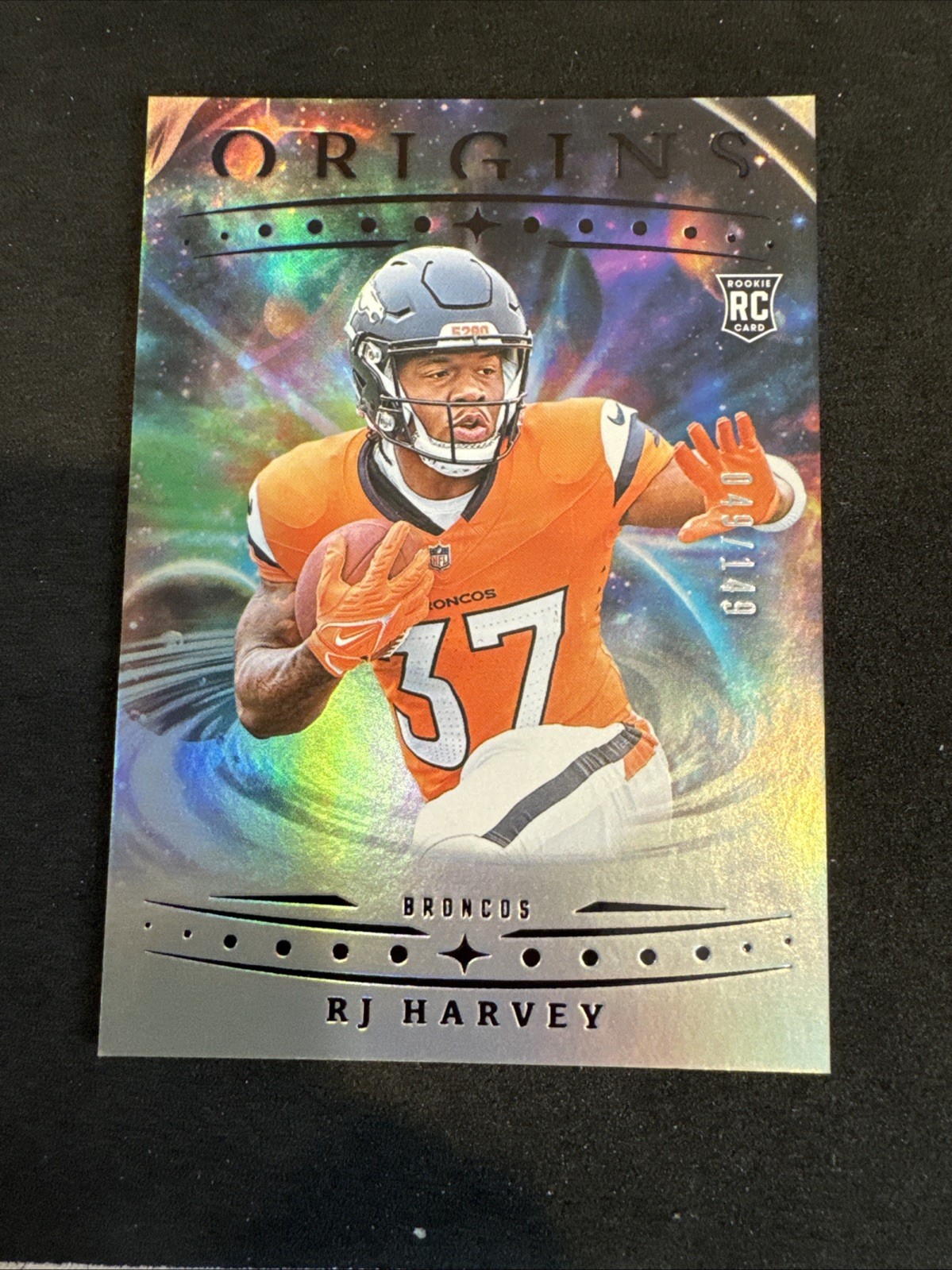 2025 Panini Origins - Rookies RJ Harvey, RJ Harvey #141 Holo Silver /149 (RC)