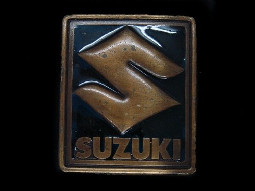 UA17159 VINTAGE 1976 **SUZUKI MOTORCYCLES** ADVERTISEMENT BELT BUCKLE