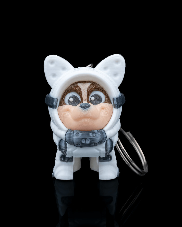 A 3D-printed retro space dog figurine channeling Laika-era Soviet space program vibes — charming desk decor with a quirky sci-fi personality.