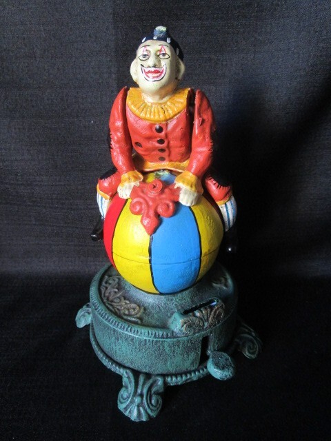 Design Toscano - Spinning Acrobat Clown - Mechanical Bank | eBay