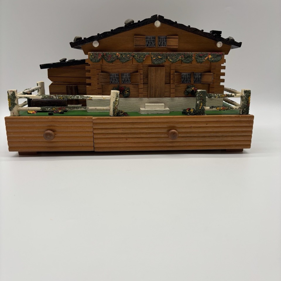 A large 13-inch Swiss chalet jewelry box with a dancing ballerina — generously sized, genuinely vintage, and wonderfully maximalist.