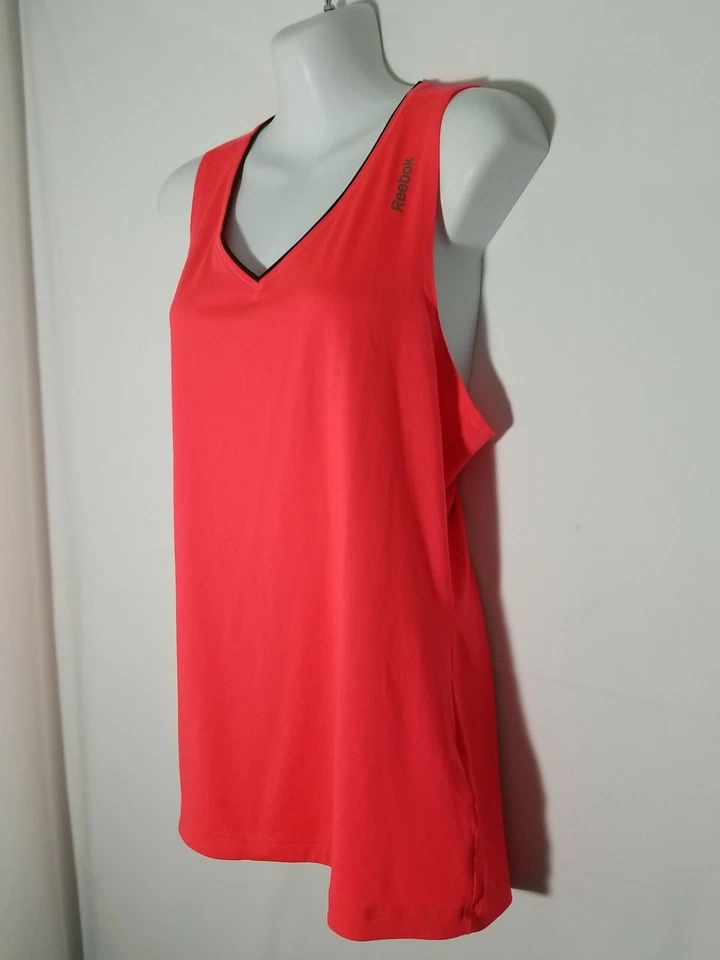 Camiseta sin mangas Reebok PlayDry alta-baja coral naranja para mujer talla M Foto 2 de 4