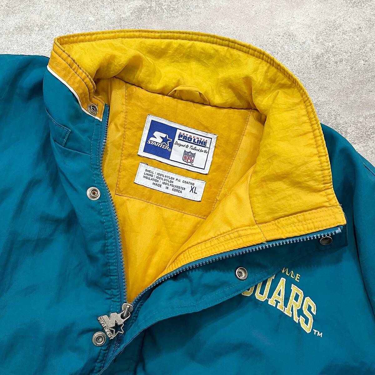 VTG 90s NFL JACKSONVILLE JAGUARS LOGO STARTER PUFFER JACKET