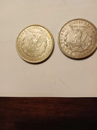 Two 1921 silver dollars  Both are in excellent condition.  Not graded but should
