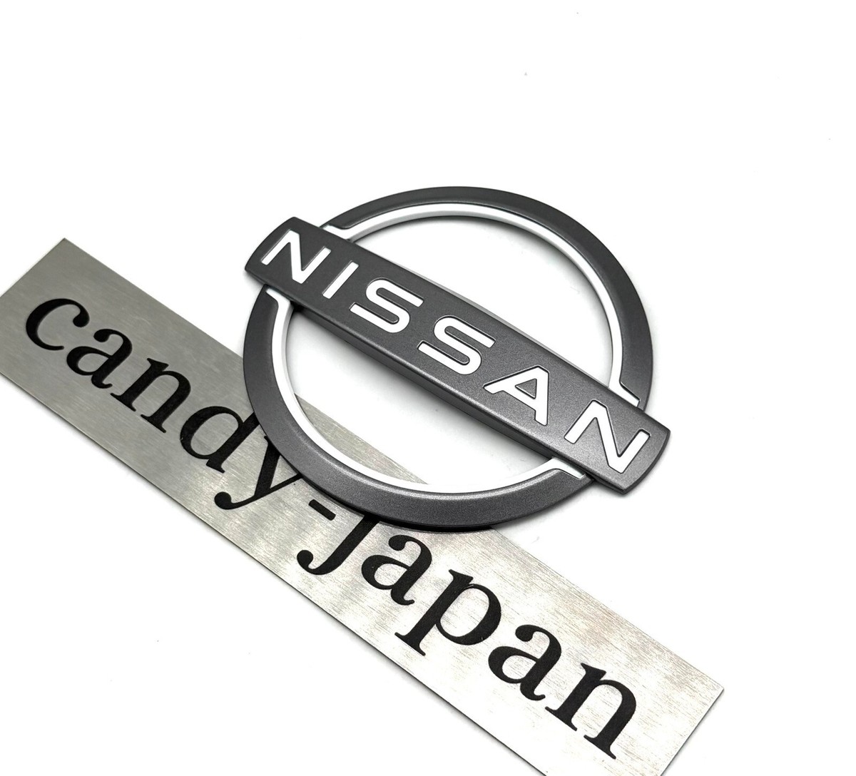 Nissan Genuine Front Bumper New Logo Emblem Badge Ornament OEM