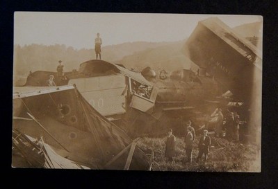 1910 RPPC BOSTON & MAINE RAILROAD TRAIN HEAD ON FREIGHT COLLISION HARBOR BRIDGE
