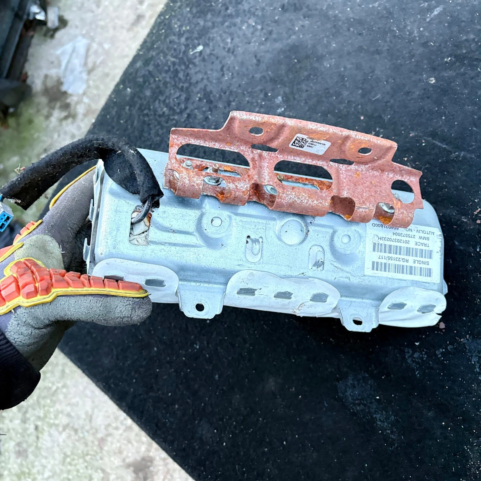 Actual MINI passenger airbag rear housing and mounting bracket