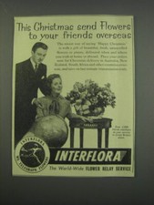 1955 Interflora Flower Relay Service Ad - This Christmas send Flowers to your