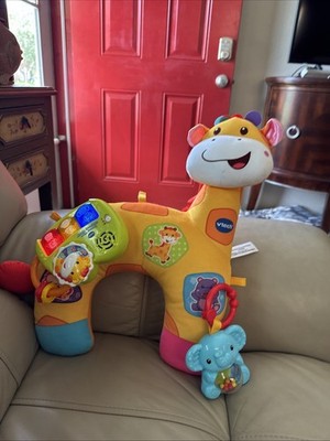 Motor Skills Giraffe Tummy Time Pillow - Travel-Friendly with 50+ Songs & Rattle
