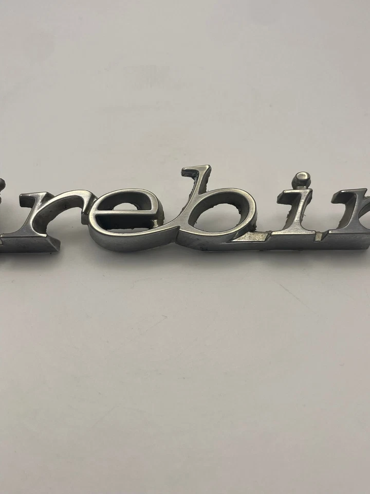 Pontiac Firebird 1971-1981 guardabarros delantero embellecedor lateral emblema de coche OEM cromo genuino Foto 3 de 4