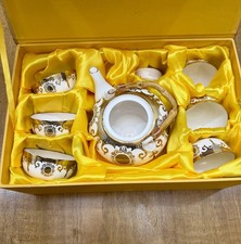 Chinese Porcelain Tea Set with Gold Decoration Teapot, Cups  Decorative Box