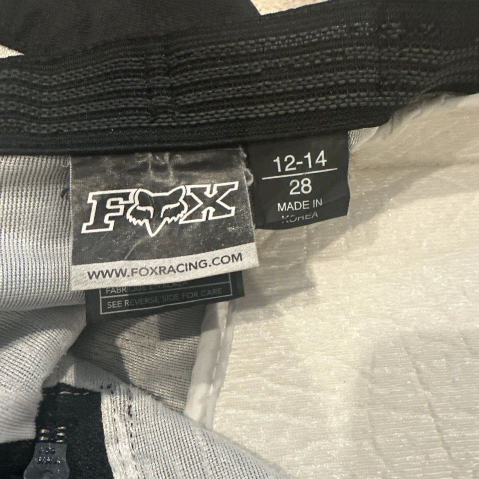 Calça ajustável Fox Racing 180 juvenil preto e branco tamanho 12-14 costura interna 28 - Imagem 3 de 4