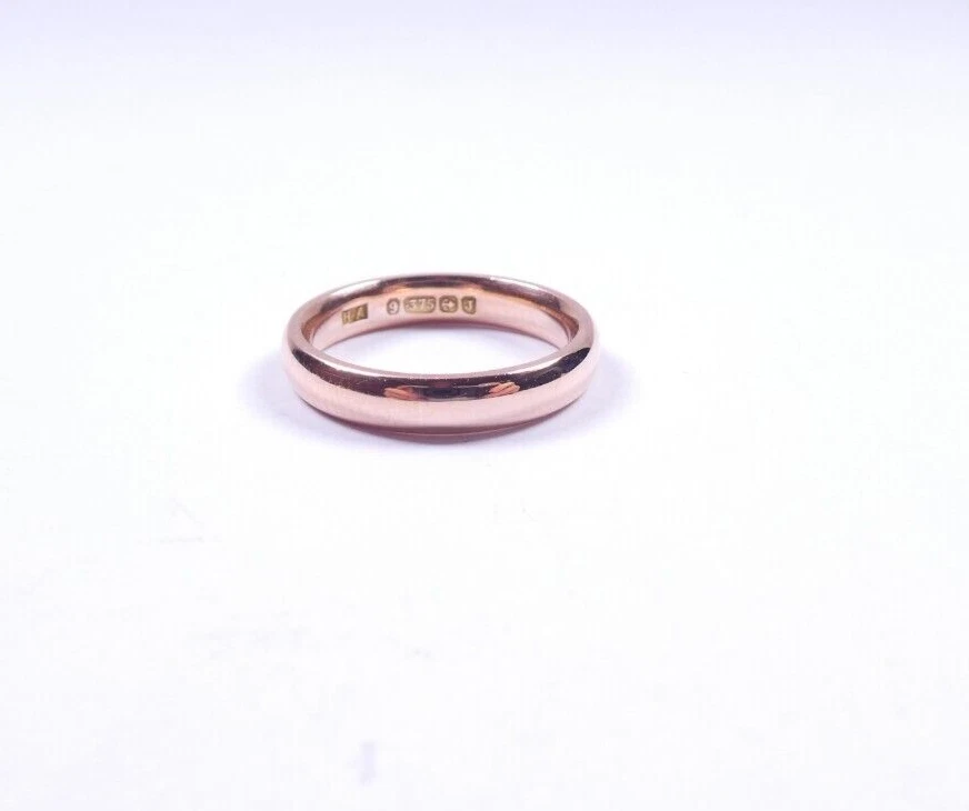 Simple rose gold shop wedding band