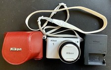 Nikon 1 J3 14.2 MP HD Digital Camera with 10-30mm VR 1 NIKKOR Lens White 