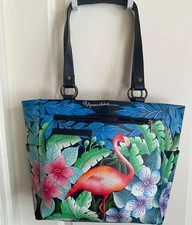 Anuschka hand-painted leather tote bag from the Flamingo Fever collection.