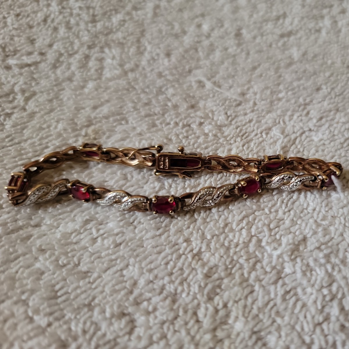 Marked 925 R China Gold over Sterling Silver Dark Red Stones Marked 925 R China Gold over Sterling Silver Dark Red Stones