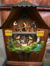Vintage GERMAN MUSICAL Cuckoo Clock with Men Chopping. Sawing/ Water Wheel
