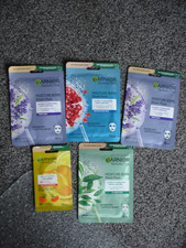 Image of Garnier Skin Active Moisture Bomb Hydrating 4 Face Masks + 1 VIT C Eye Mask