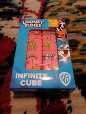NIB WB LOONEY TUNES Infinity Cube Fidget Toy Anxiety Stress Durable Tweety Pink