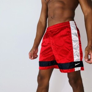 red nike nylon shorts