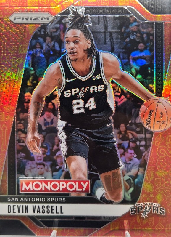 2024-25 Panini Prizm Monopoly Devin Vassell Orange Classic Icons #/1499 Spurs