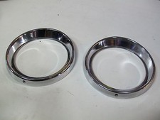 COPPIA CORNICI FANALI ANTERIORI AUTOBIANCHI PRIMULA - NUOVE - ORIGINALI