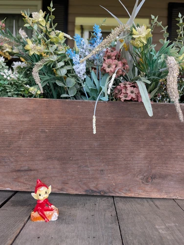 Vintage 40/50s Red Suited Pixie Boy Elf Sitting on Log Figurine