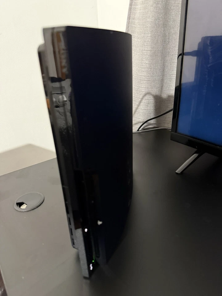 Sony PlayStation 3 Slim Negro Foto 4 de 4