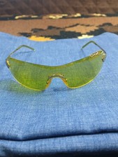 Gafas perforadas Christian Dior con escudo amarillo tintadas auténtico diseñador