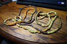 Long strand of African Krobo powder glass beads Multiple colors