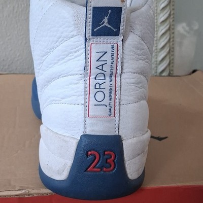Jordan Air Jordan 12 Men s White/Blue High Top Leather Lace Up Sneakers