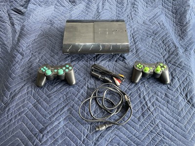 PS3 Super Slim Console with Two Controllers Blu Ray Player 
