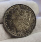 1887 US Morgan Dollar $1 (Cleaned,Retoned) AU